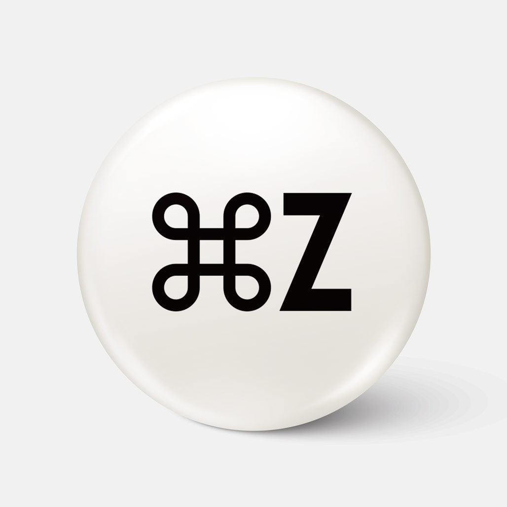 ⌘Z - Suaitheantas