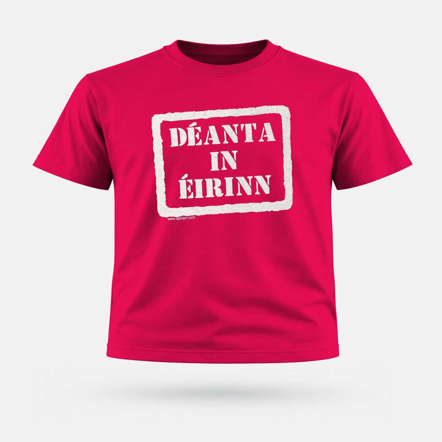 Pink t-shirt with white text on a white background